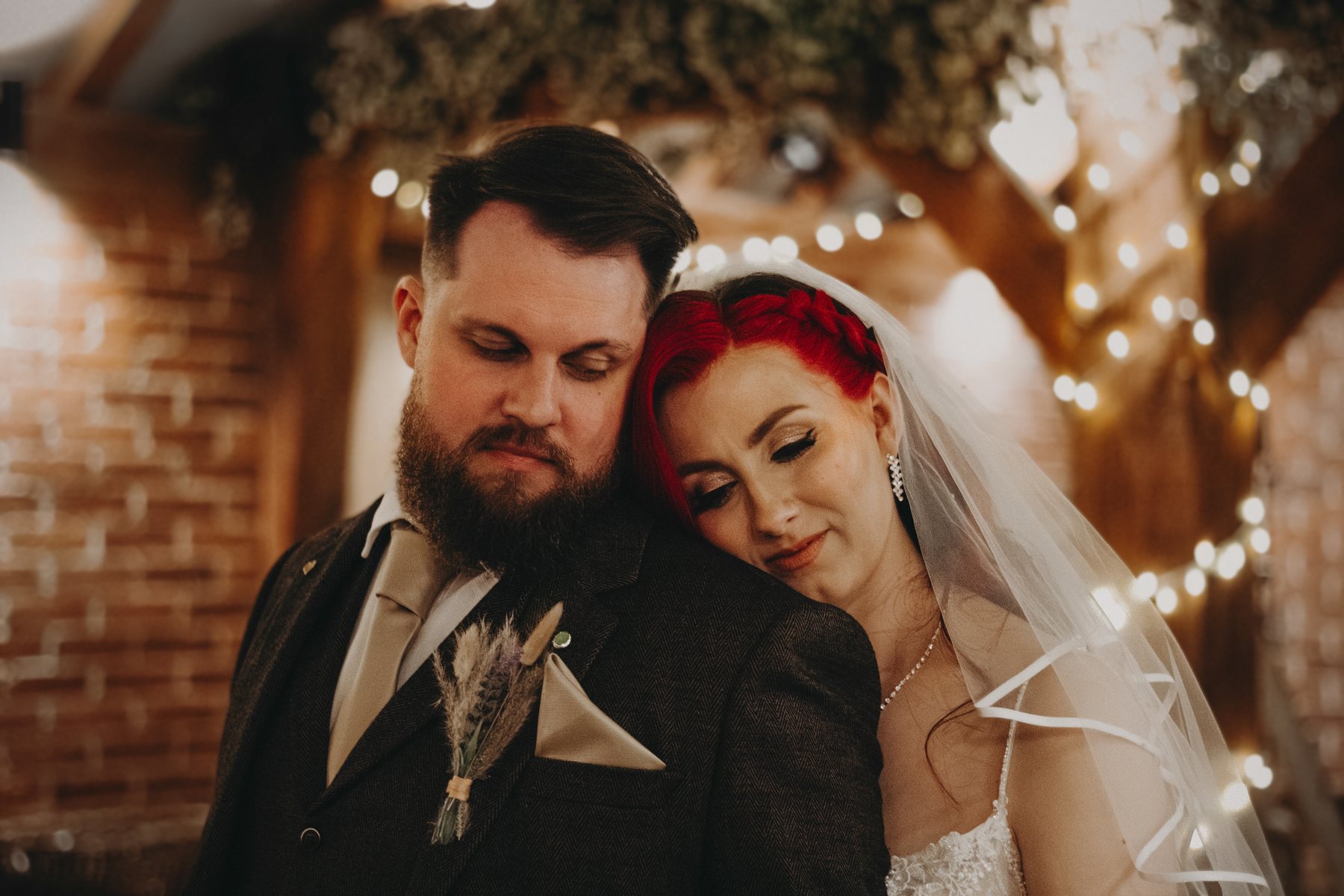 Confetti thrown over a couple leaving a church